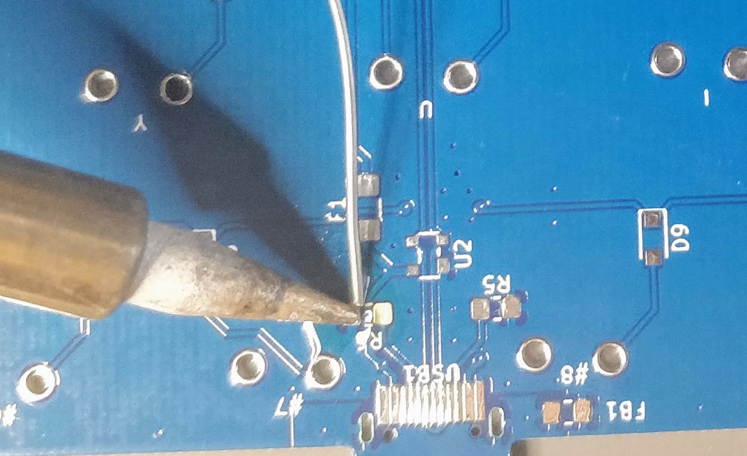 Adding a small amount of solder on pad